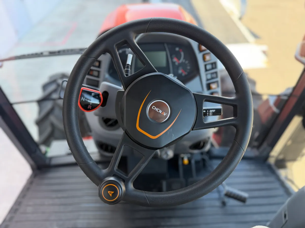 CHCNAV steering motor on the steering column of a Kubota M6 tractor