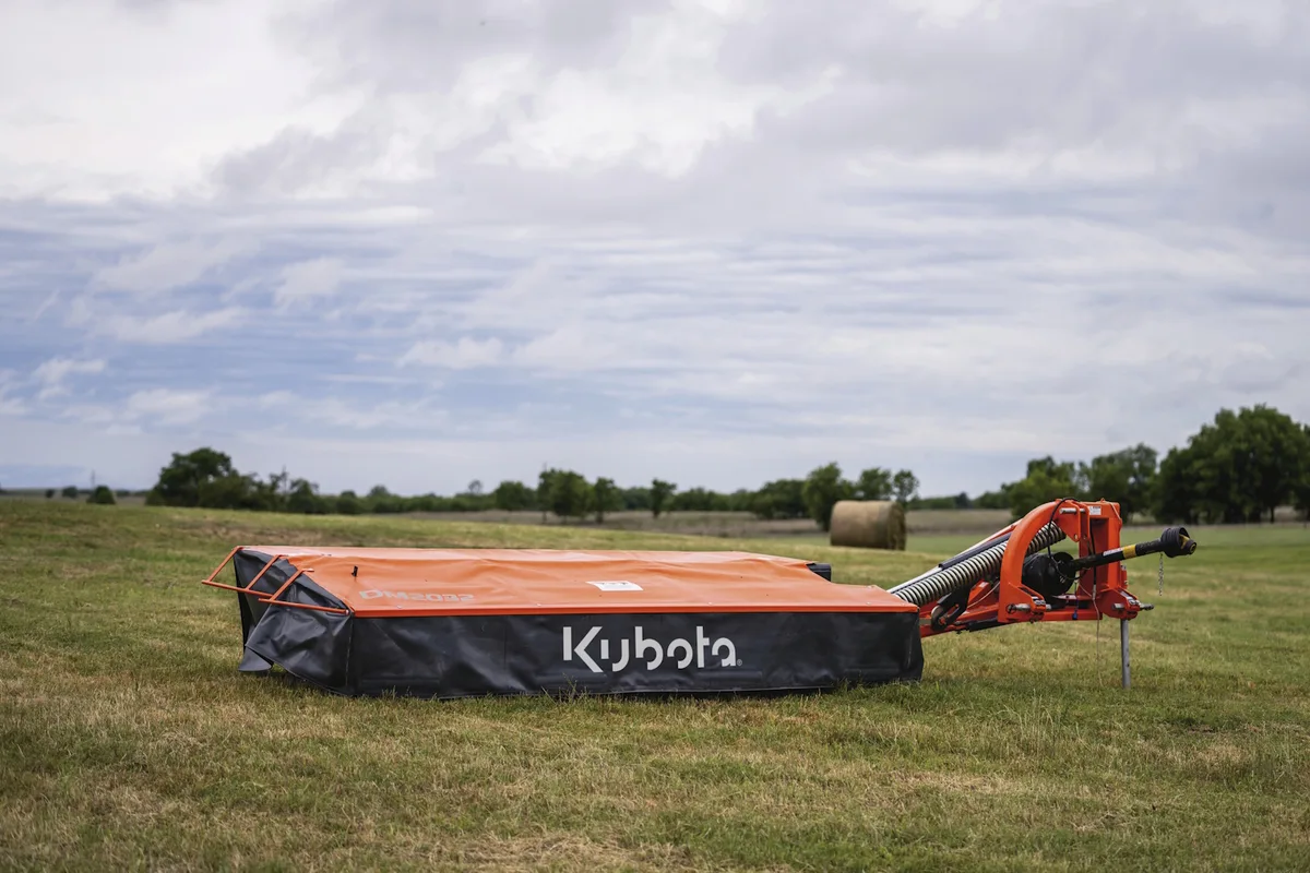 Kubota DM disc mower in a hay field