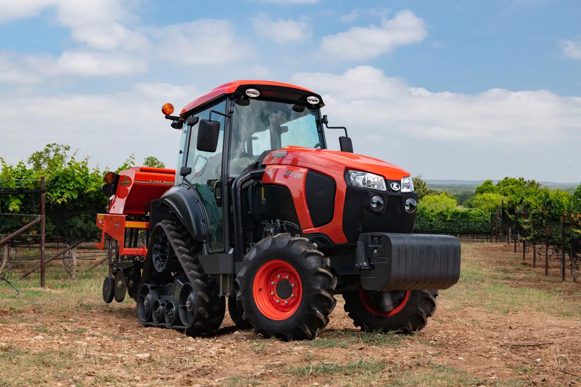 Kubota M5 Narrow specialty tractor in a vineyard row