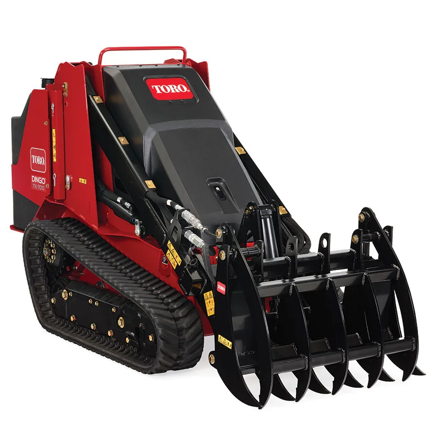 Toro Dingo TX 700 tracked loader on a white background
