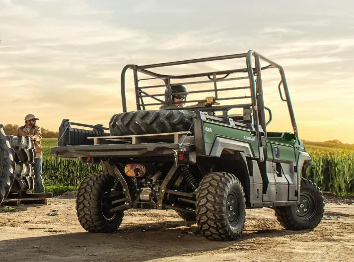 Kawasaki MULE PRO-FX three-passenger utility vehicle carrying ranch supplies