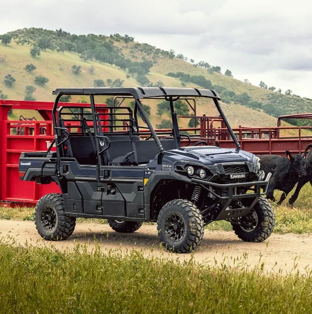 Kawasaki MULE PRO-FXT Trans Cab utility vehicle near cattle pens