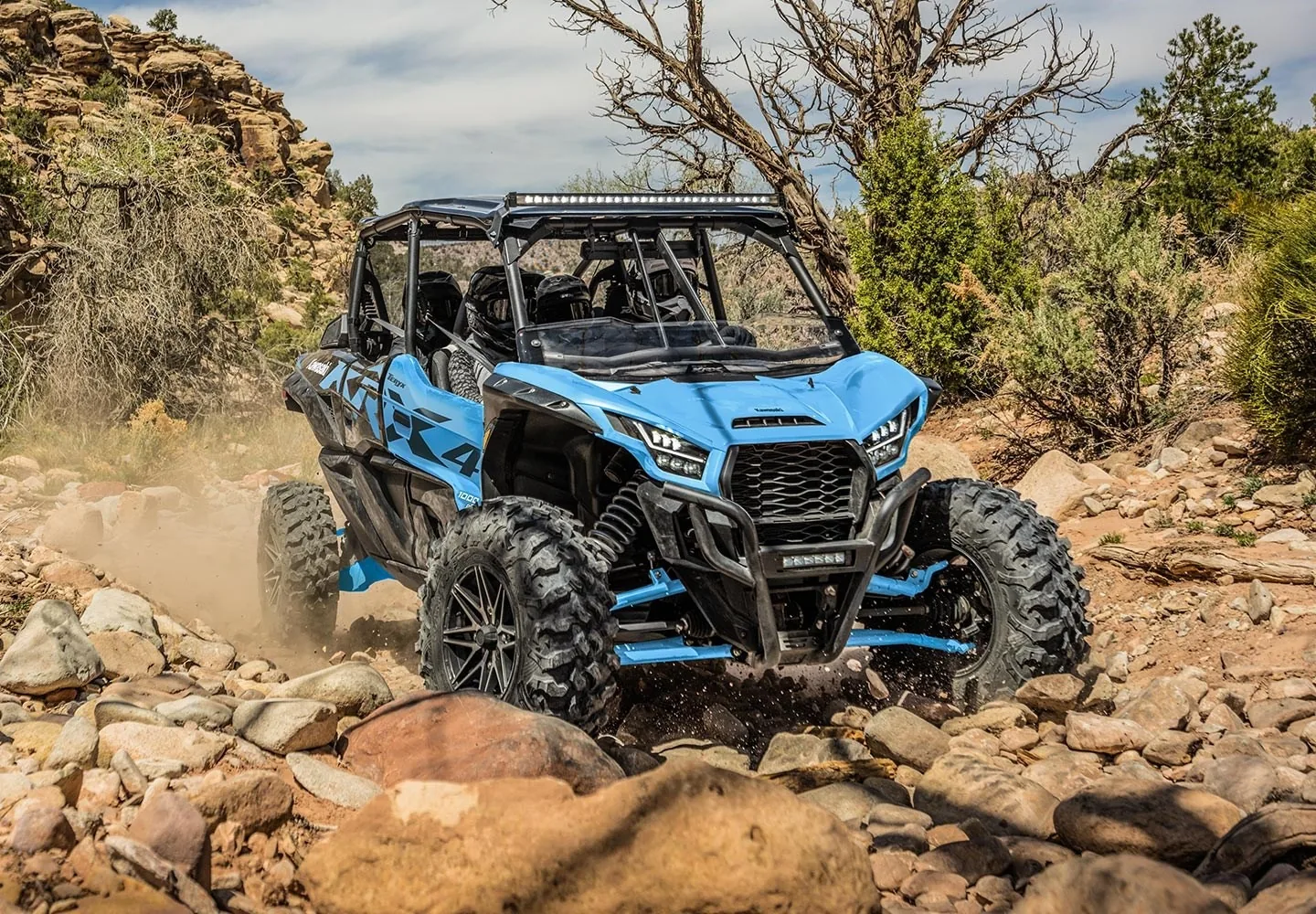 Kawasaki TERYX KRX4 1000 four-passenger side-by-side on a rocky trail