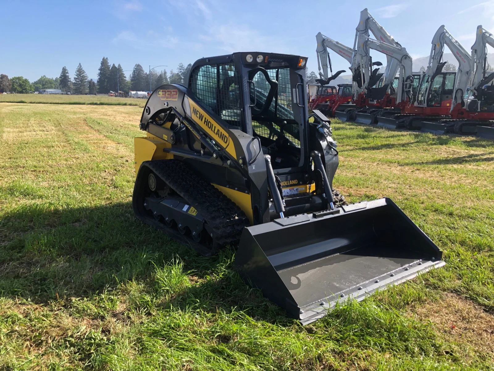 New Holland C332 compact track loader in a front three-quarter view from the opposite side