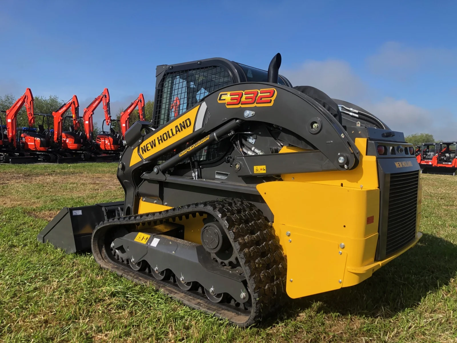 New Holland C332 compact track loader in a rear three-quarter view