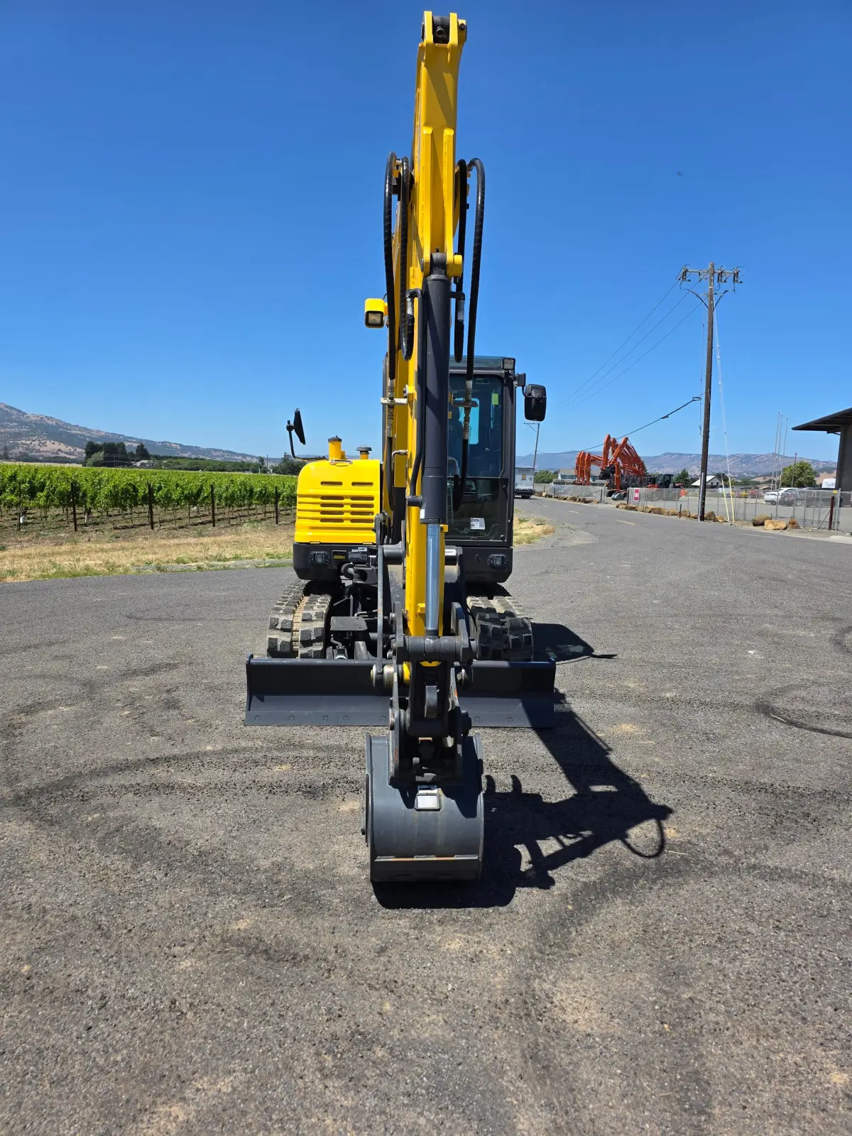 Actual stock photo 4 of New Holland E57C, stock 006901