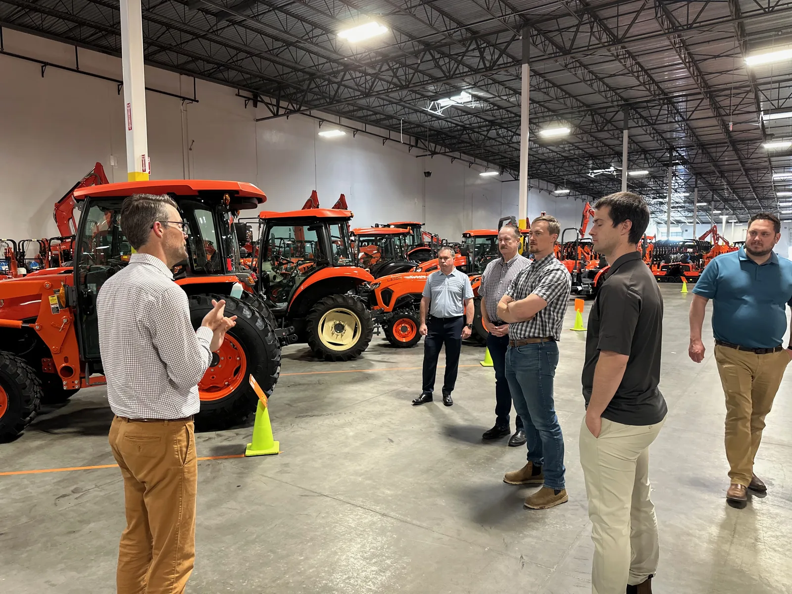 Garton team members training together in an equipment shop