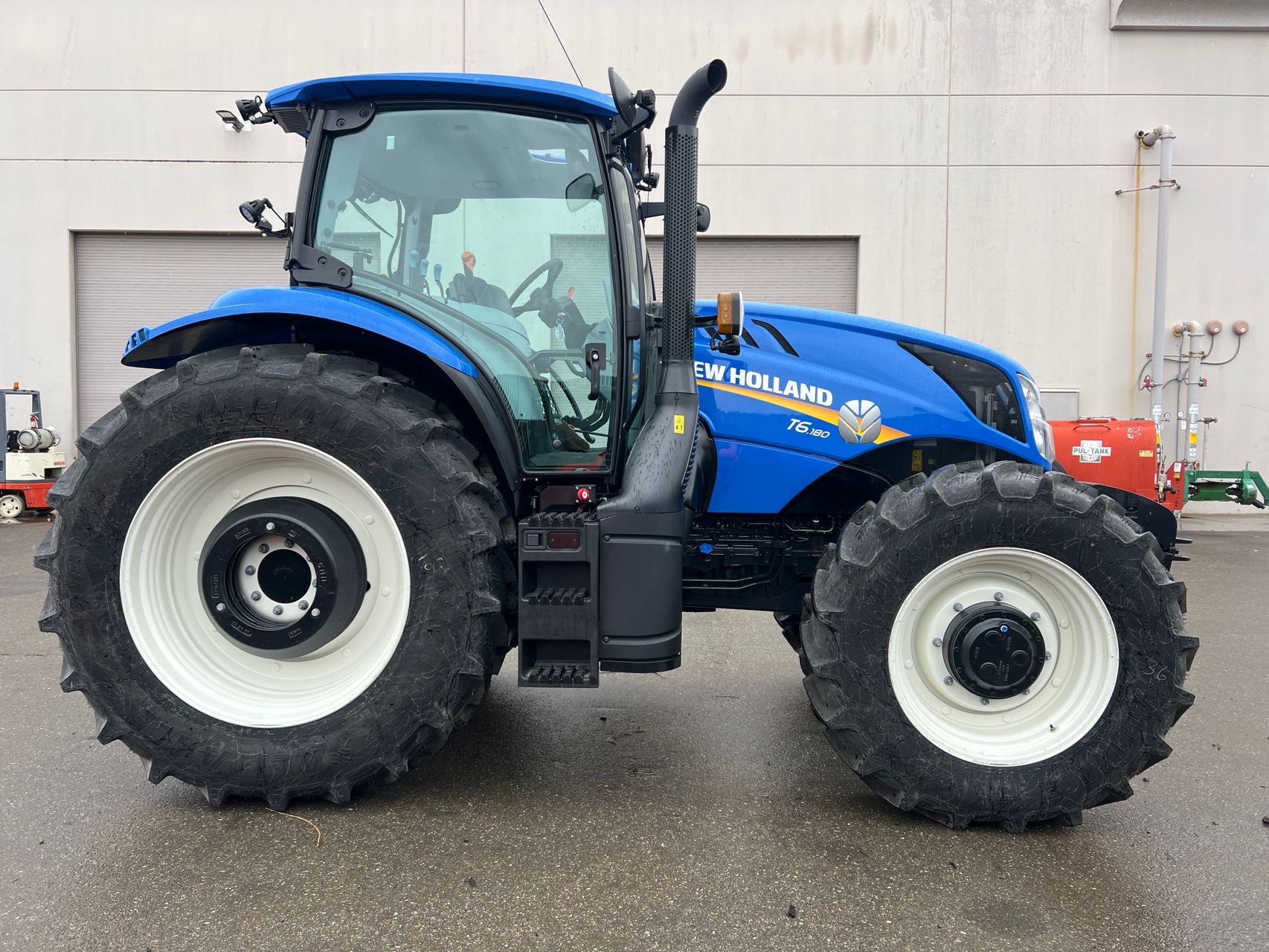 Actual stock photo of New Holland T6.180 EC, stock 003028