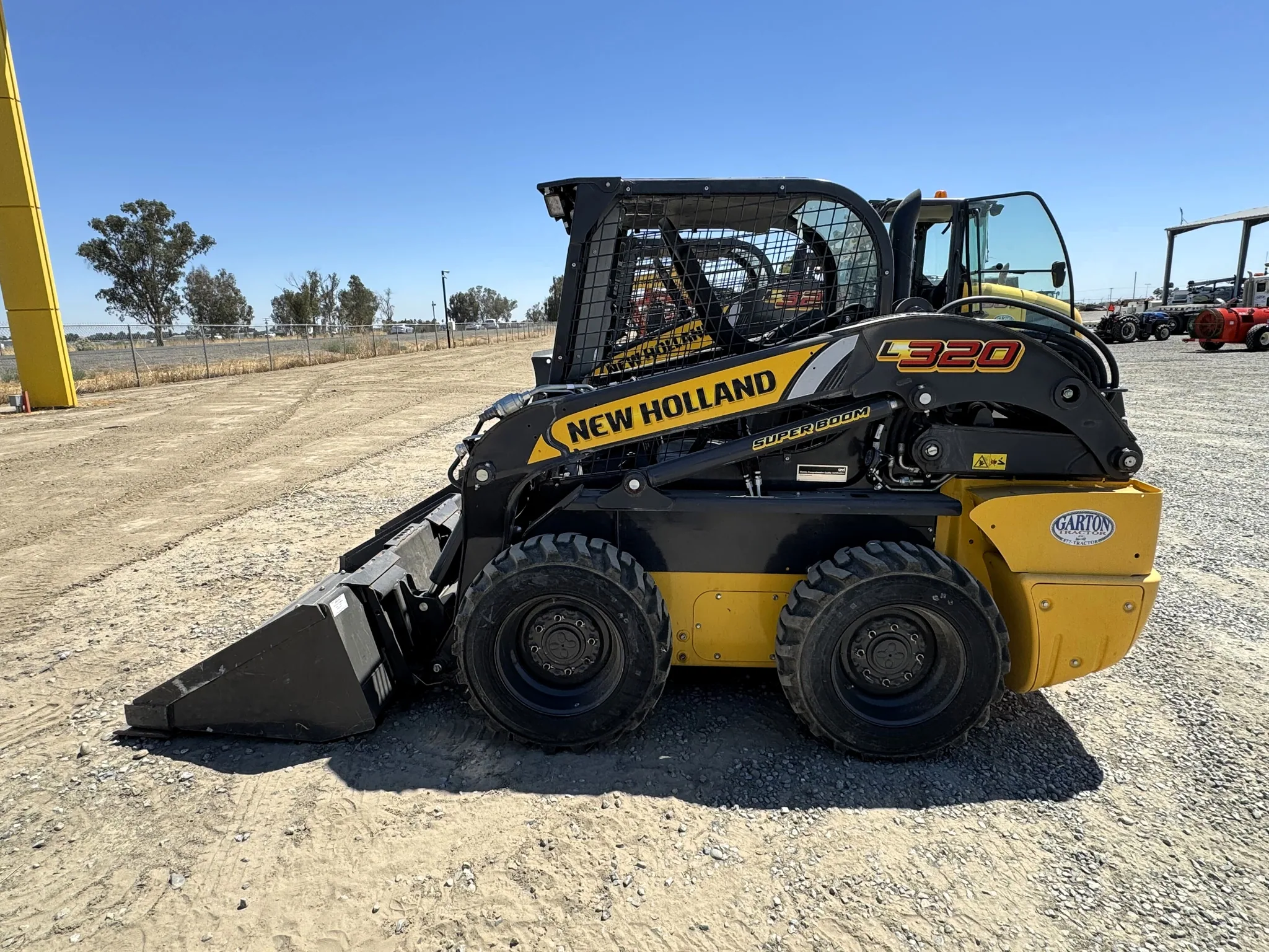 Actual stock photo of New Holland L320, stock C91388