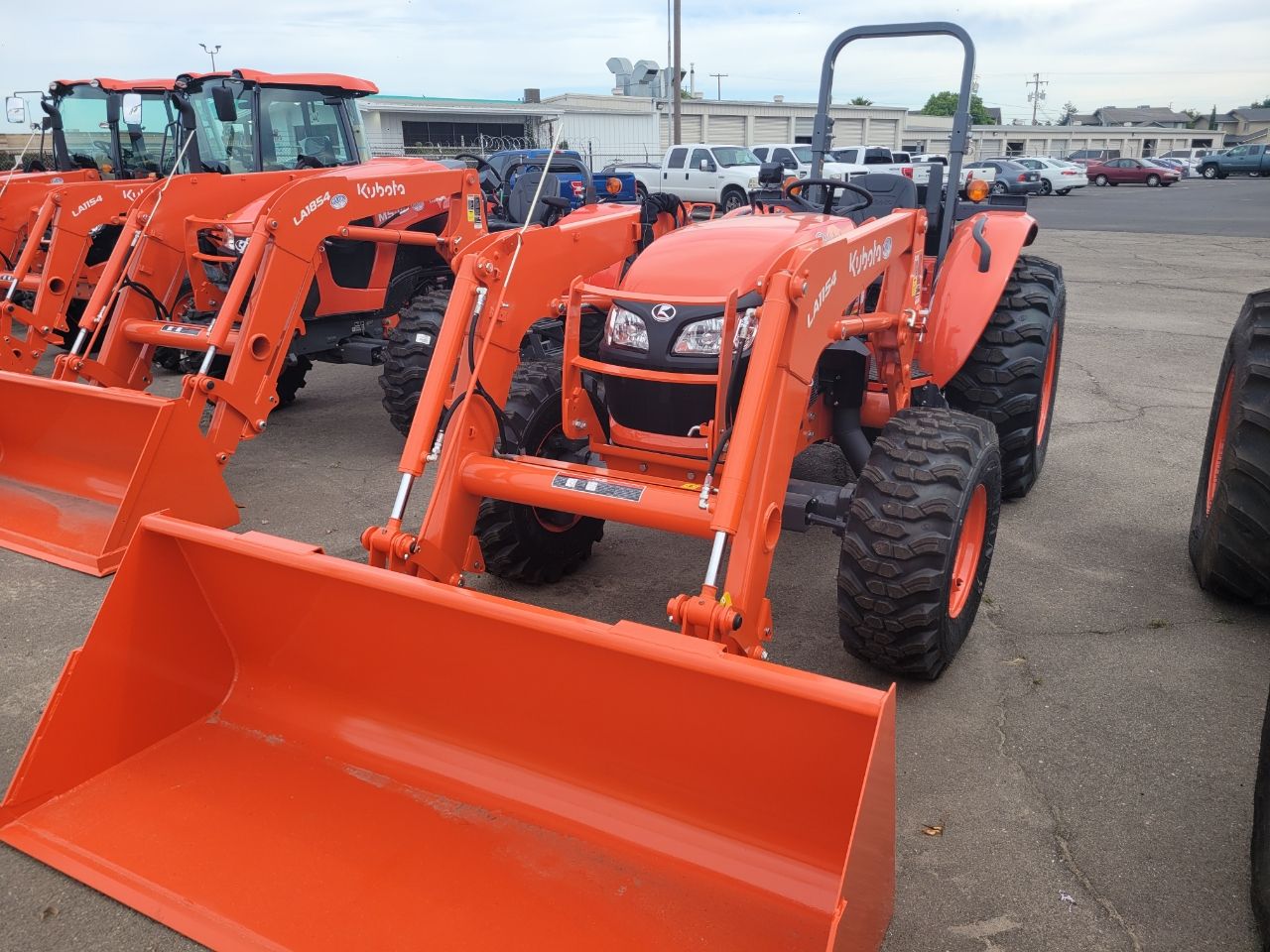 Actual stock photo of Kubota M7060HD12, stock 020835