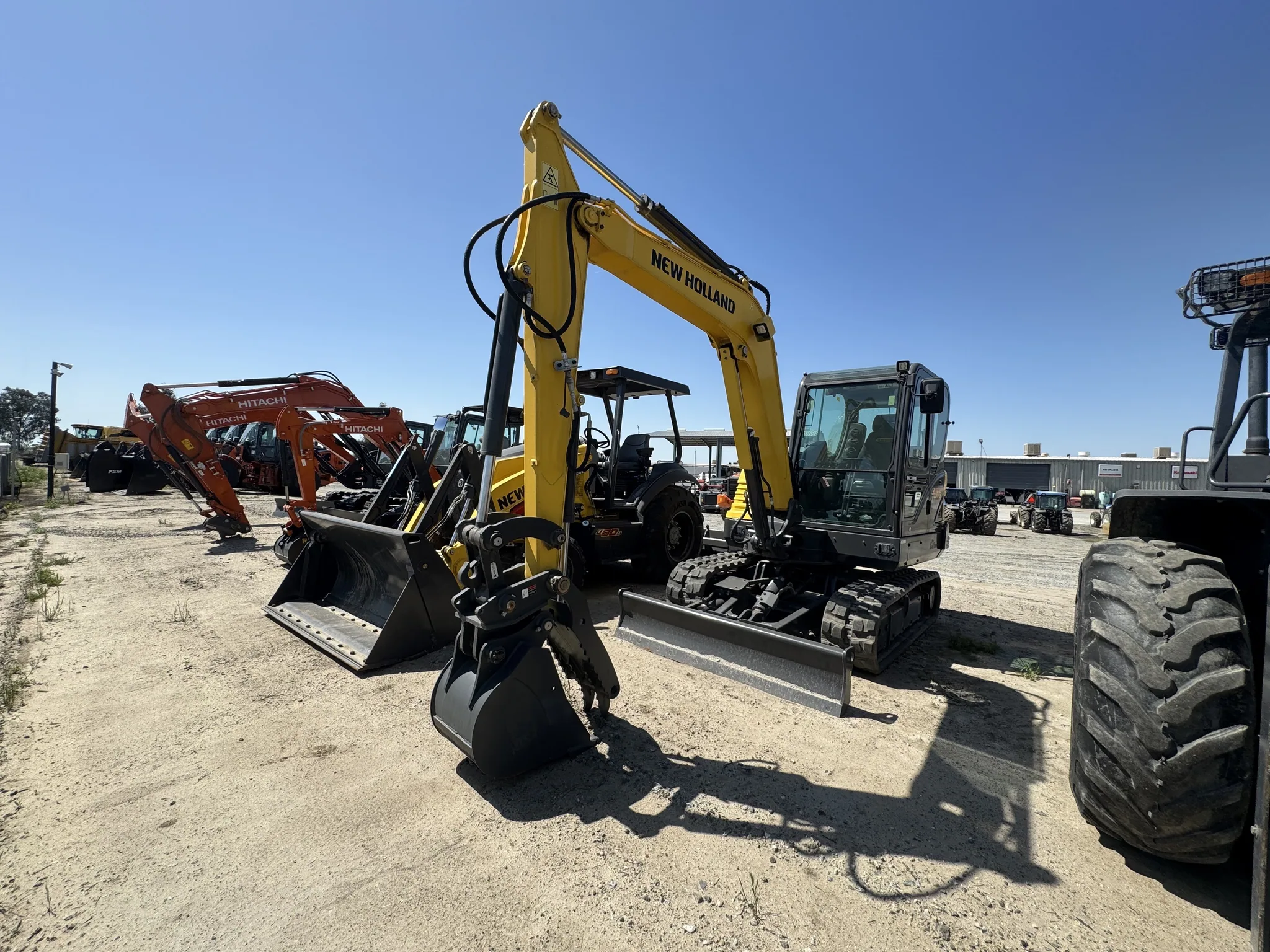 Actual stock photo of New Holland E57C, stock F92449