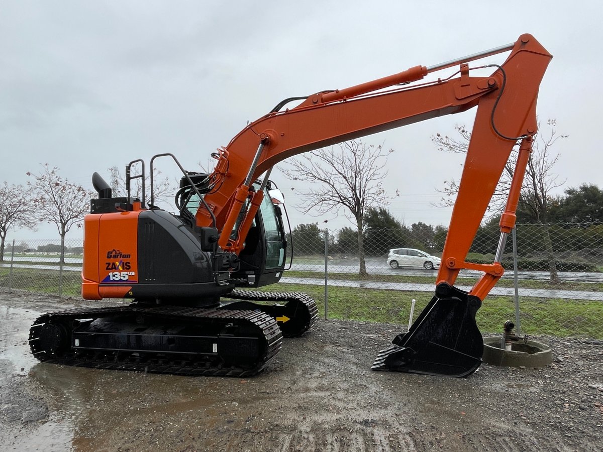 Actual stock photo of Hitachi LANDCROS ZX135US-6, stock AA6977