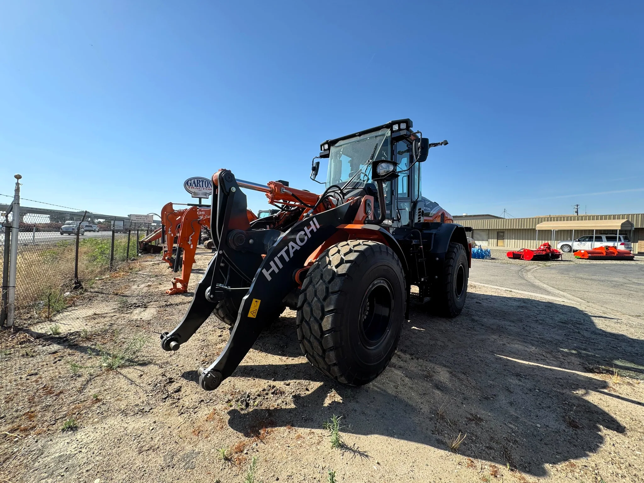 Actual stock photo of Hitachi LANDCROS ZW180-7, stock 026393