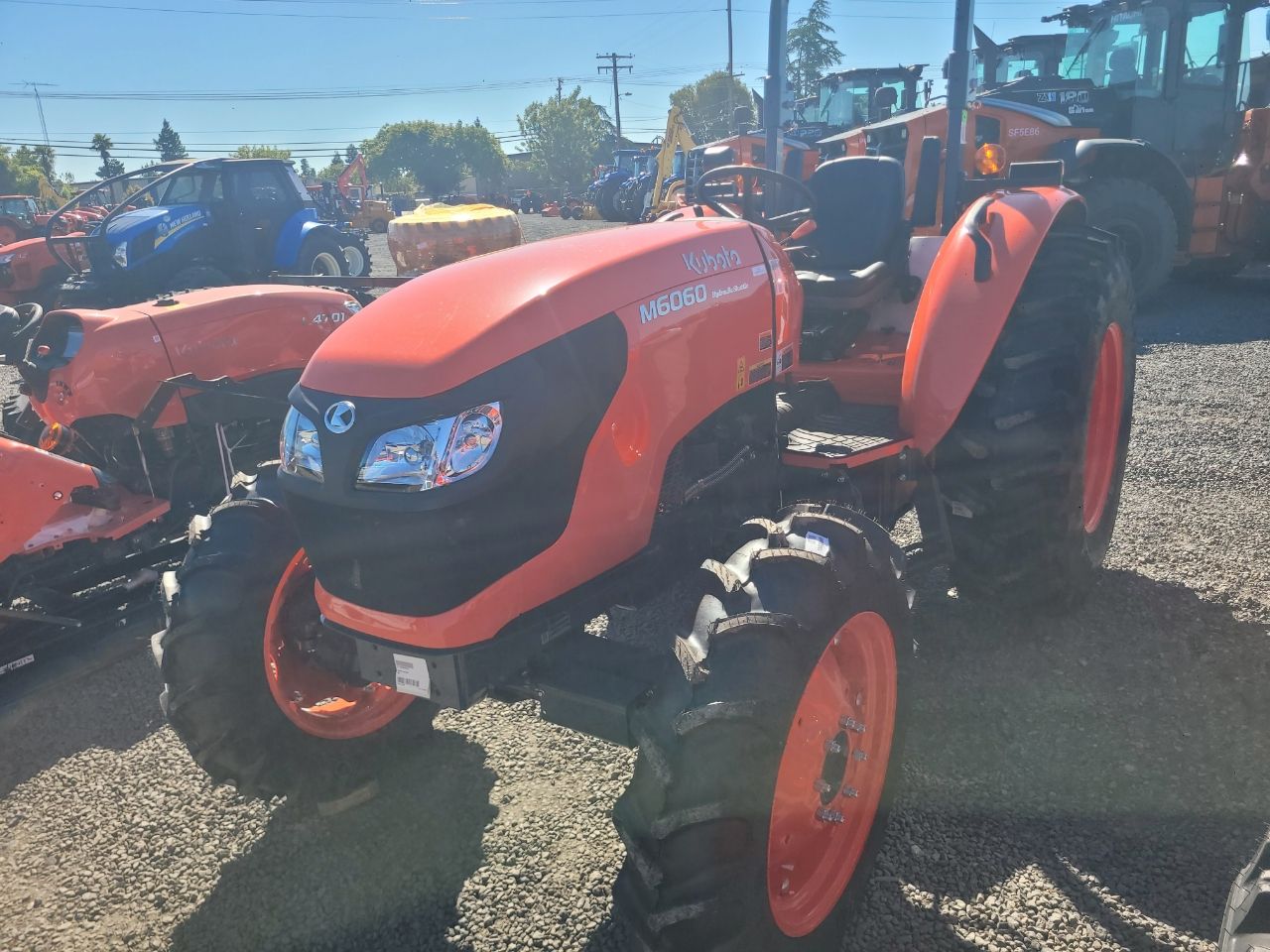 Actual stock photo of Kubota M6060HD, stock 025207