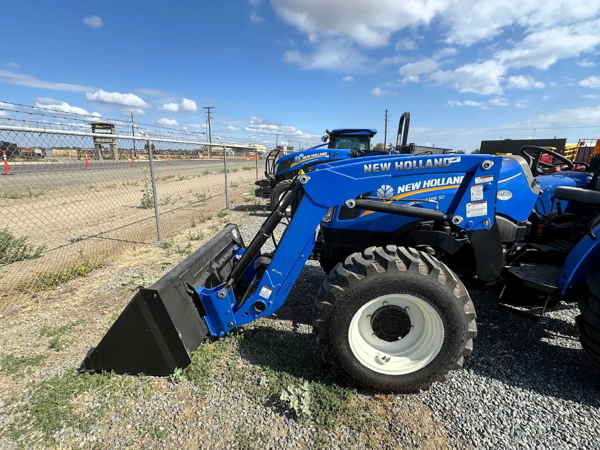 Actual stock photo of New Holland 611TL, stock 021802