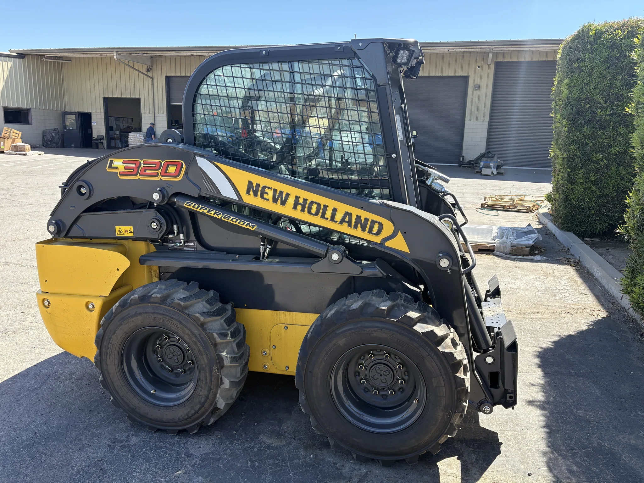 Actual stock photo of New Holland L320, stock 025927